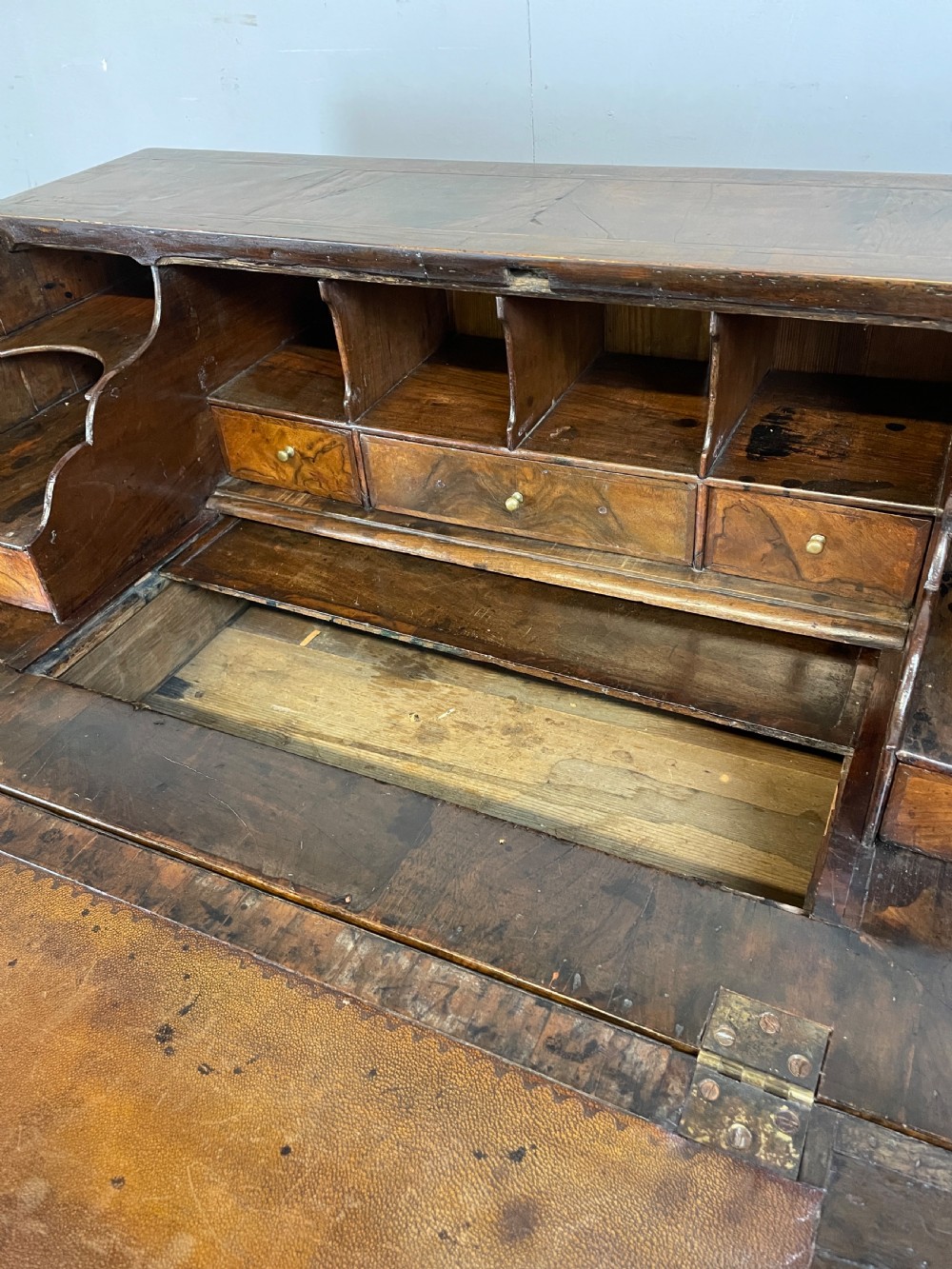 Early eighteenth century walnut bureau on original bun feet  View VIII