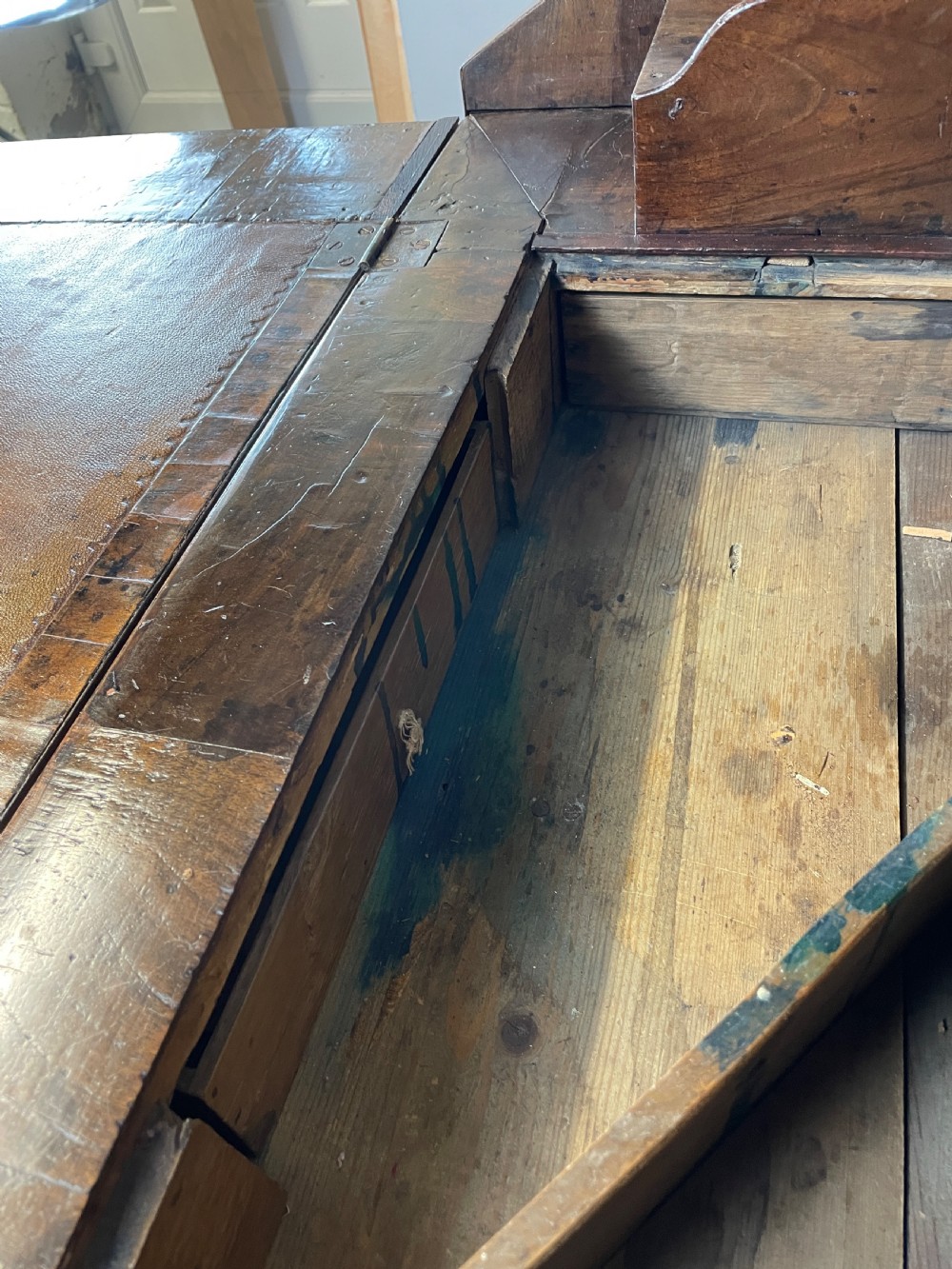 Early eighteenth century walnut bureau on original bun feet  View IX