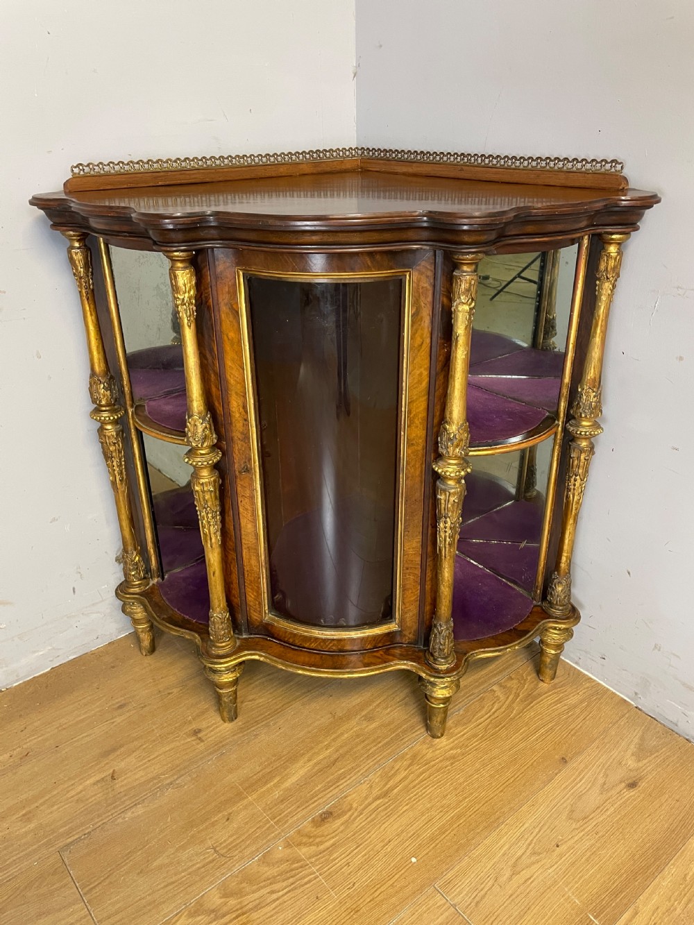 C19TH walnut and carved giltwood floor standing corner cabinet 