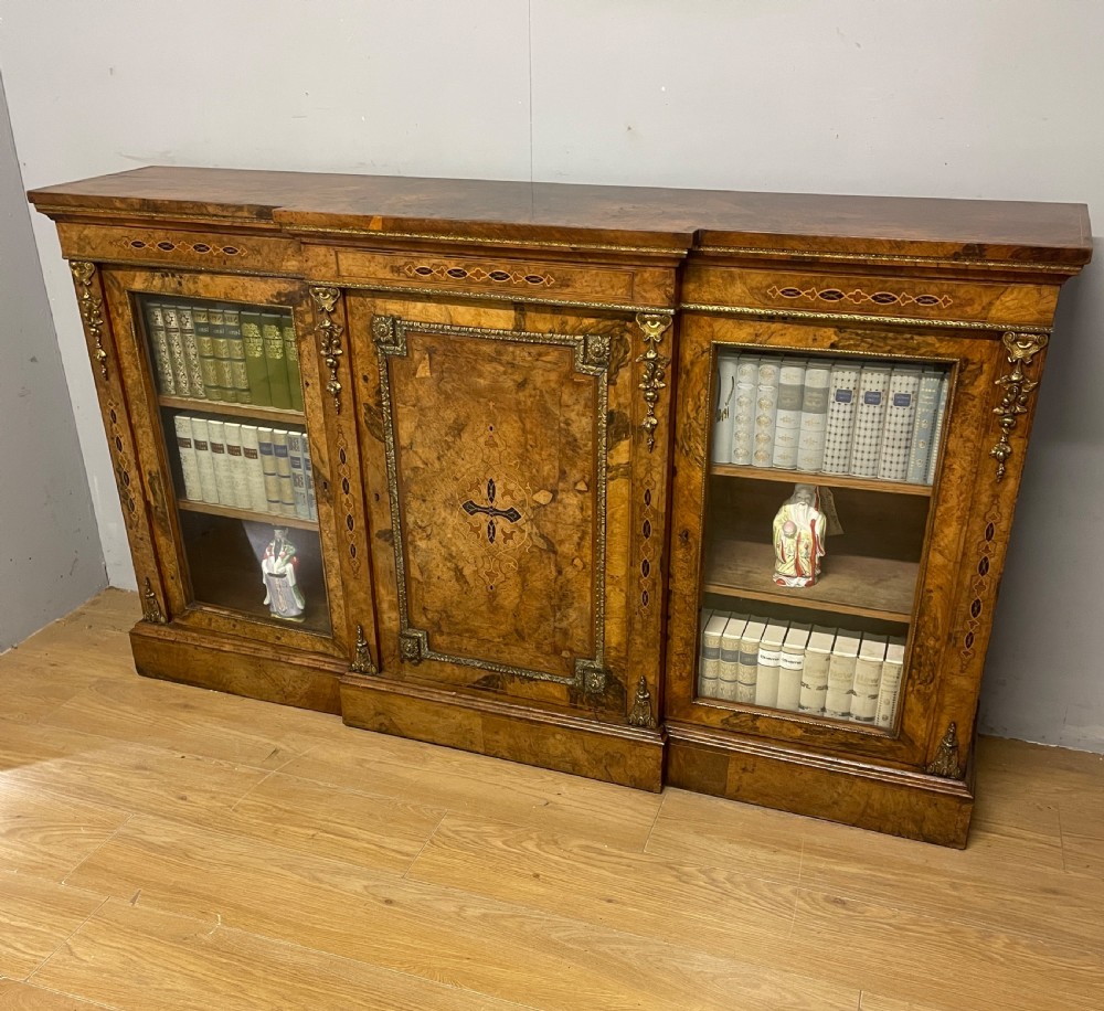 C19TH inlaid walnut ormolu mounted three door bookcase 