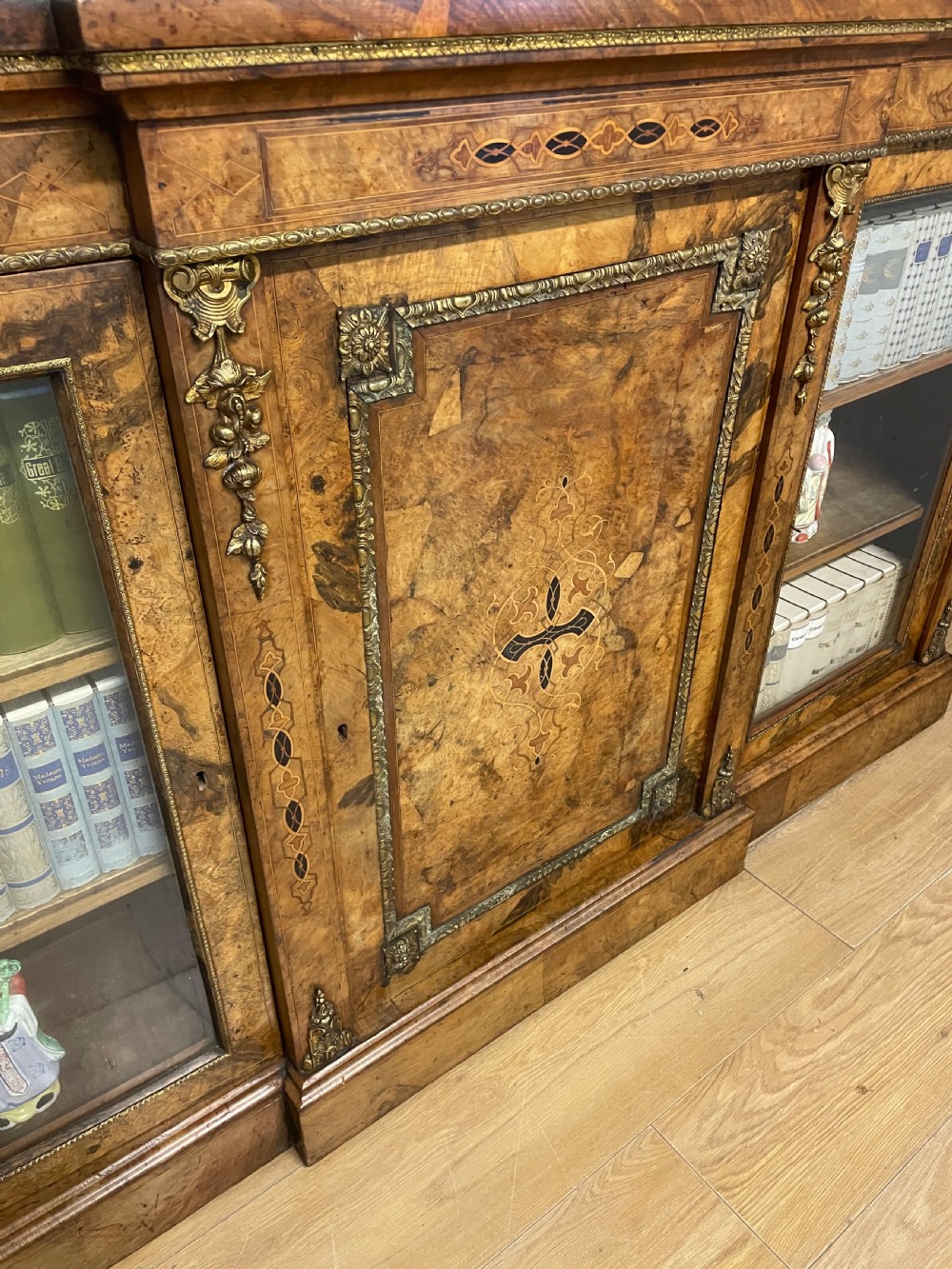 C19TH inlaid walnut ormolu mounted three door bookcase  View IV