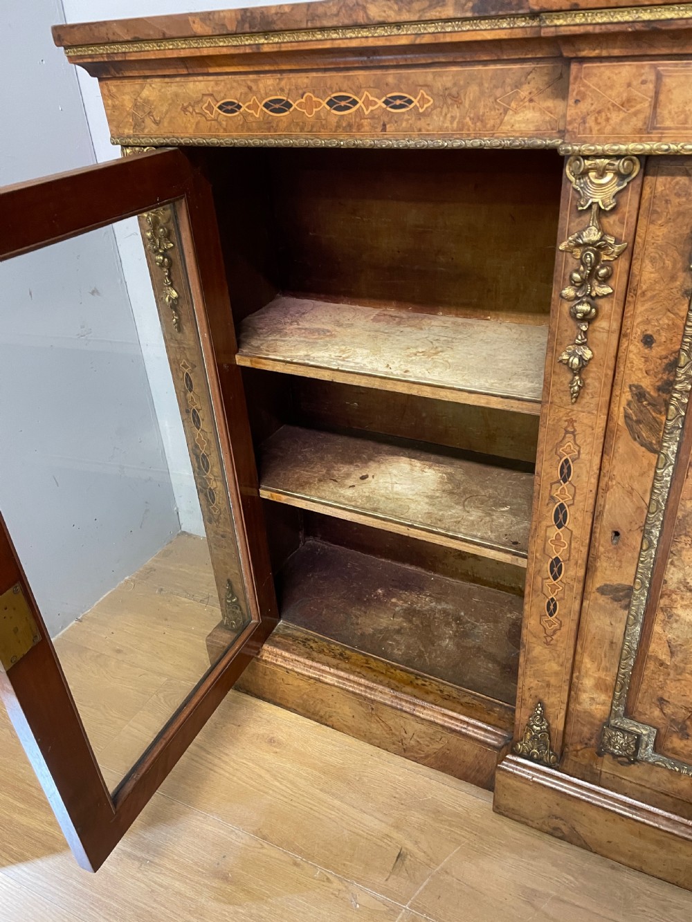 C19TH inlaid walnut ormolu mounted three door bookcase  View XIII