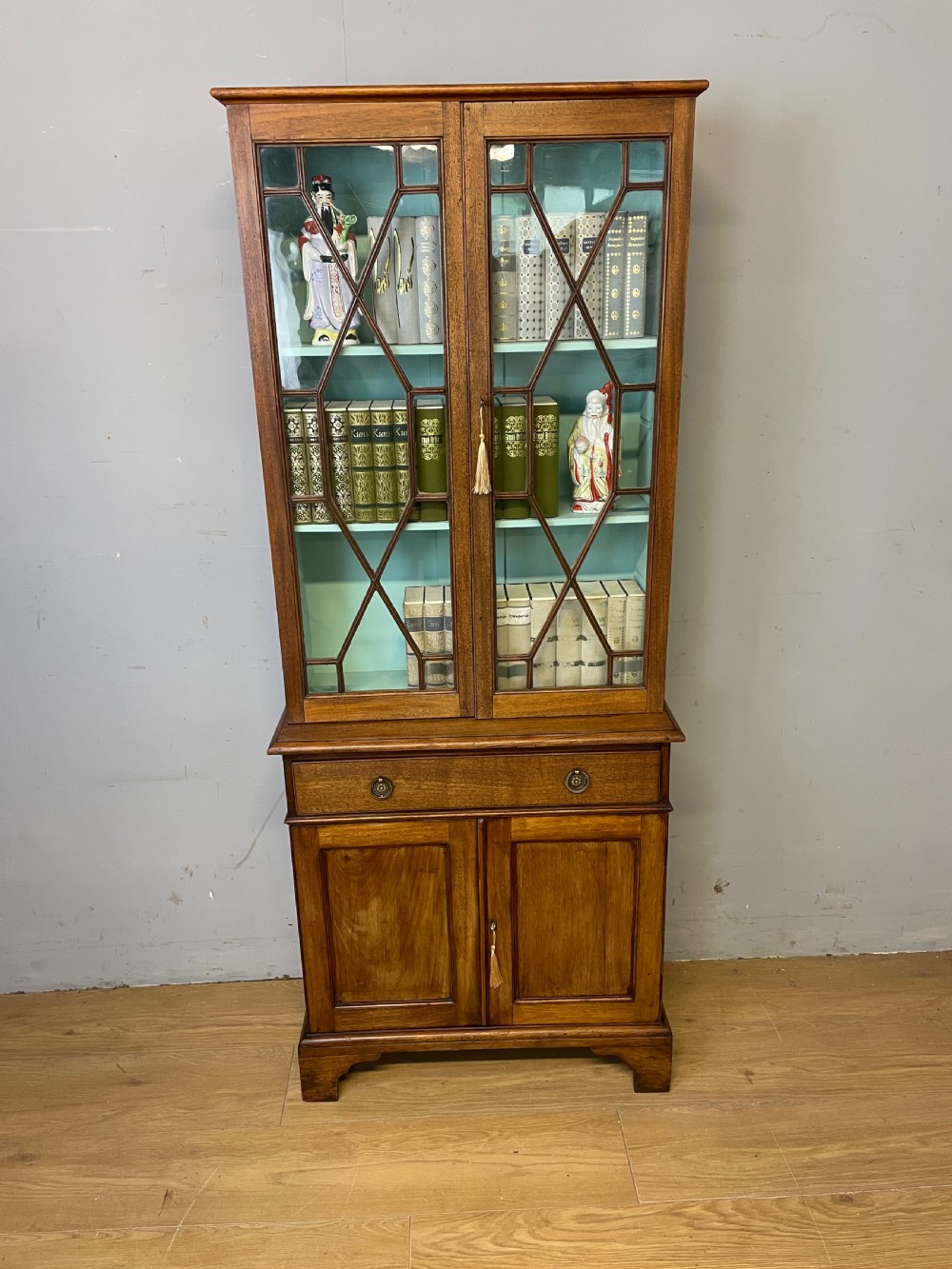 C19th small mahogany bookcase over cupboard only 69 cm wide  View II