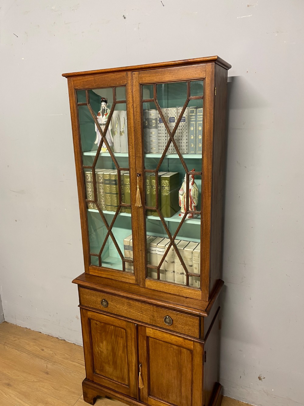 C19th small mahogany bookcase over cupboard only 69 cm wide  View III
