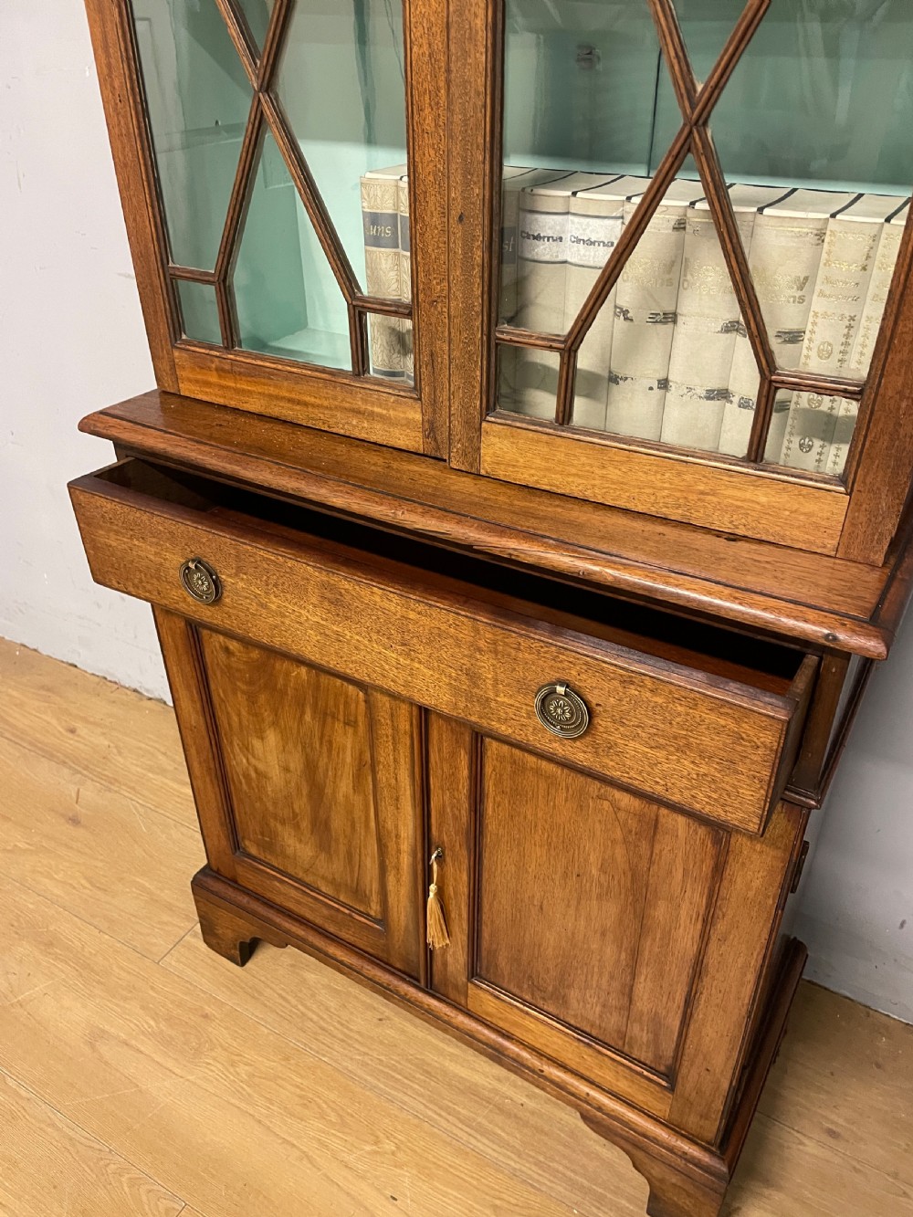 C19th small mahogany bookcase over cupboard only 69 cm wide  View VI