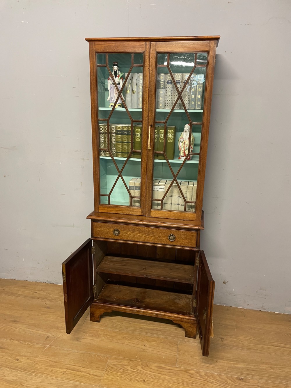 C19th small mahogany bookcase over cupboard only 69 cm wide  View VII