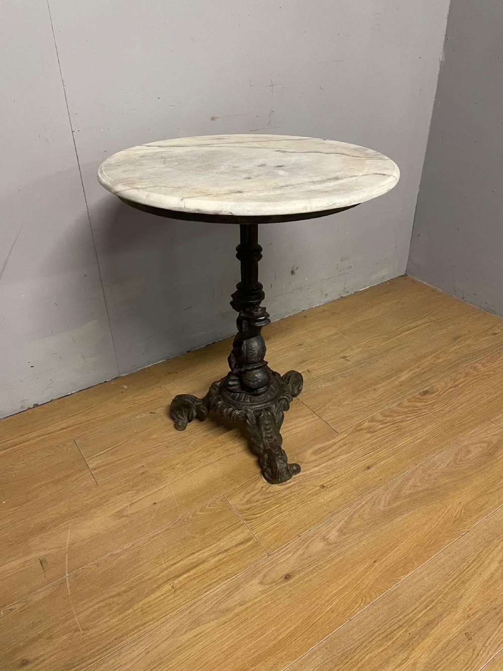 C19TH cast iron tripod table with white Carrara marble top 
