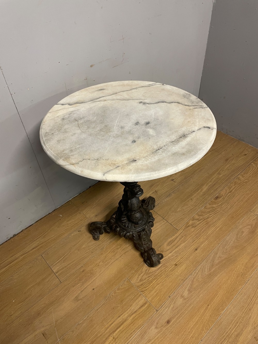 C19TH cast iron tripod table with white Carrara marble top  View II