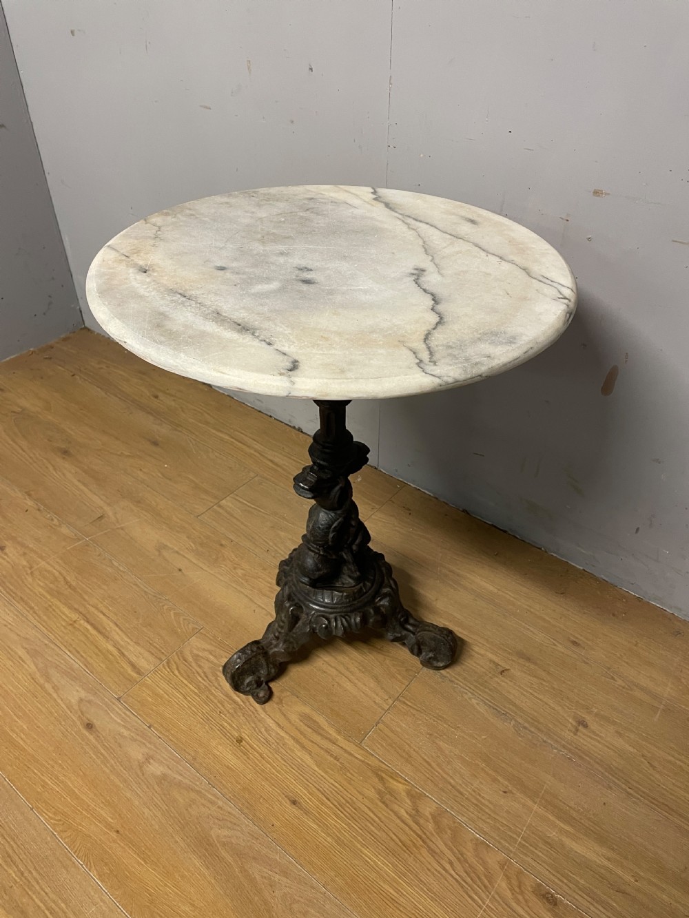 C19TH cast iron tripod table with white Carrara marble top  View IV