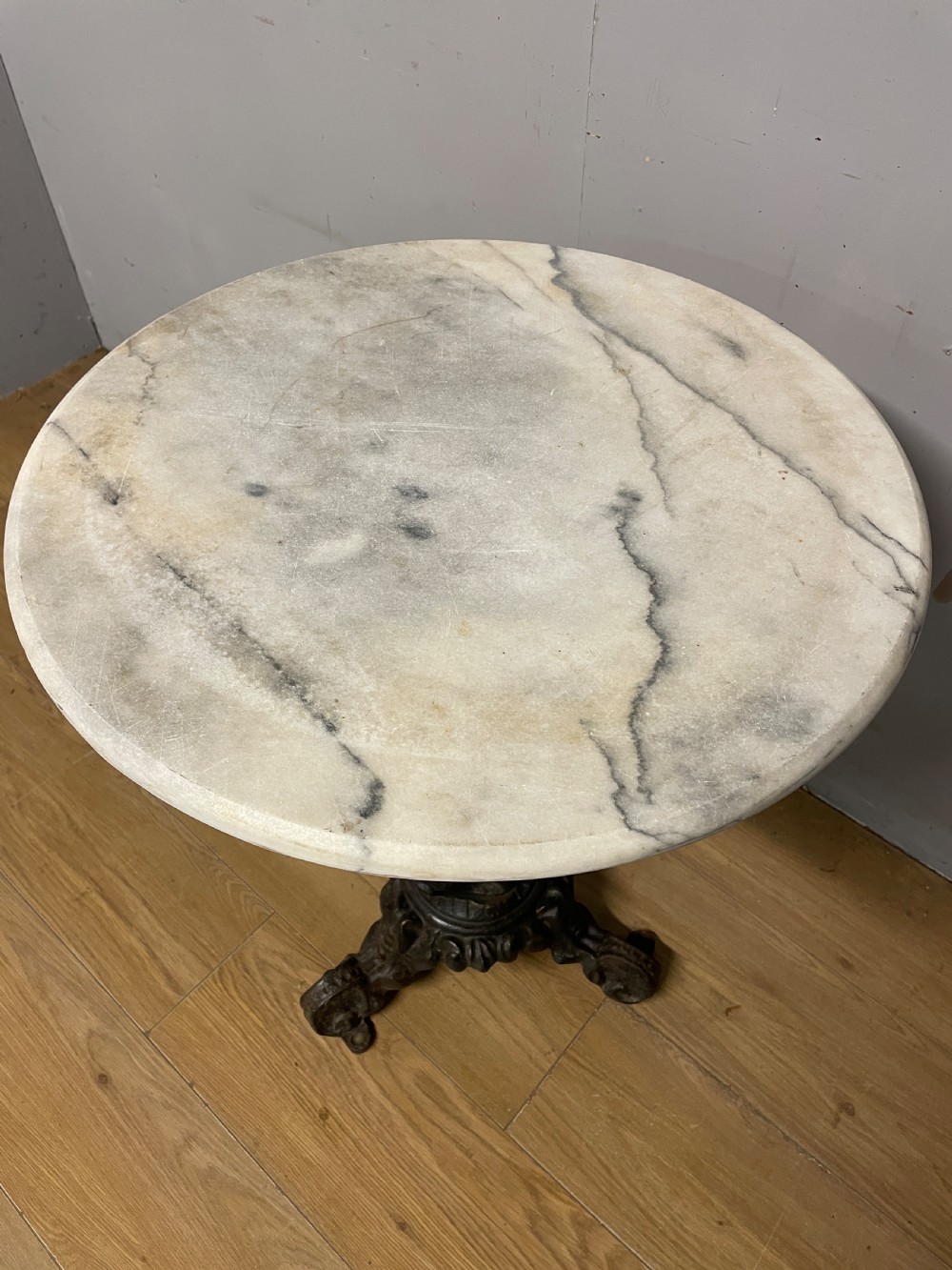 C19TH cast iron tripod table with white Carrara marble top  View V