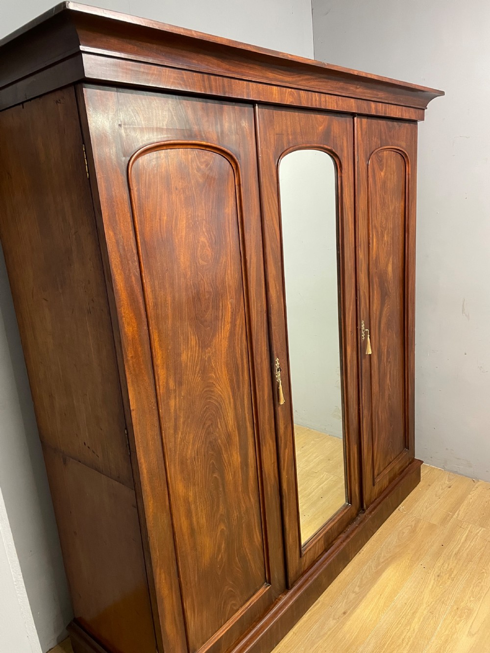 C19TH flame mahogany country house three door triple wardrobe  View II