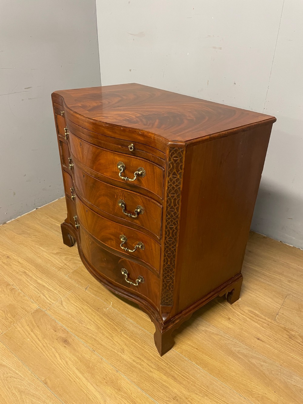 Edwardian small flame mahogany serpentine chest of drawers  View X