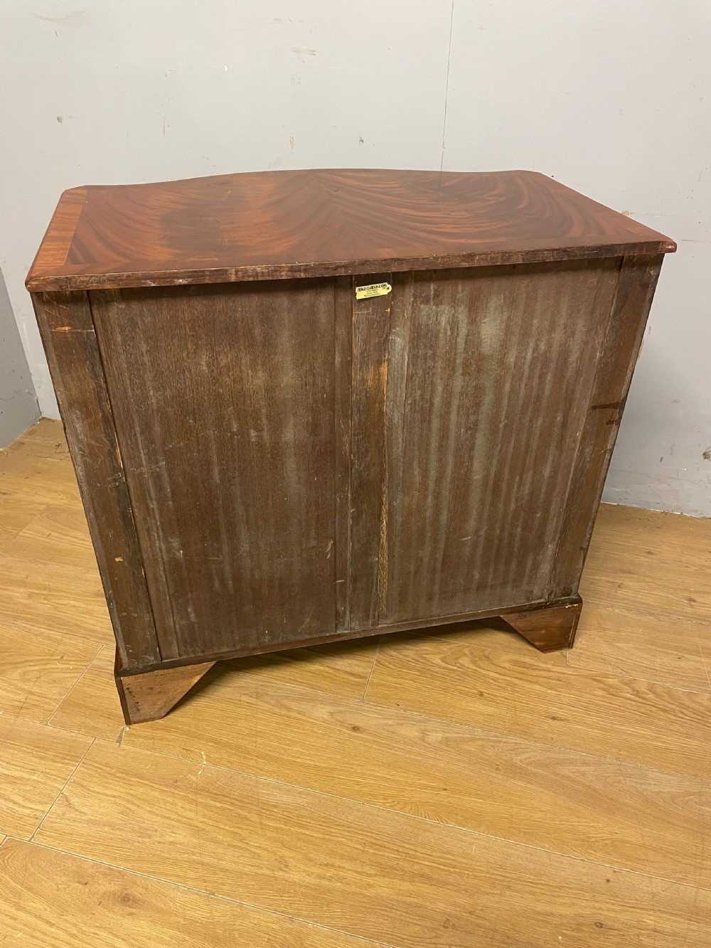 Edwardian small flame mahogany serpentine chest of drawers  View XI