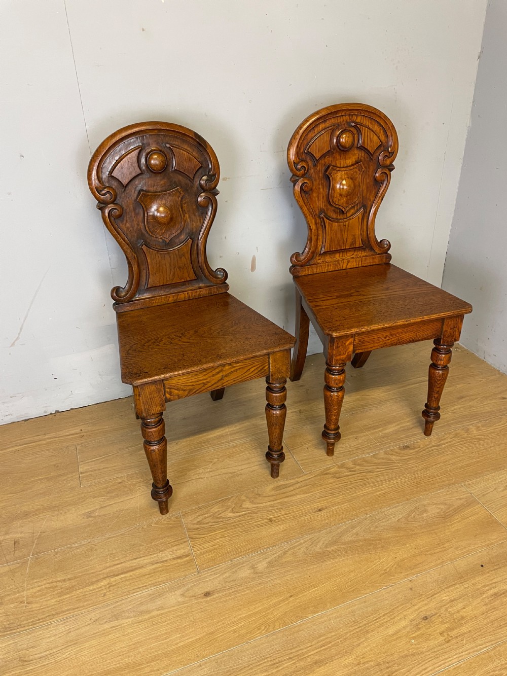 Pair of carved oak nineteenth century hall chairs  View III