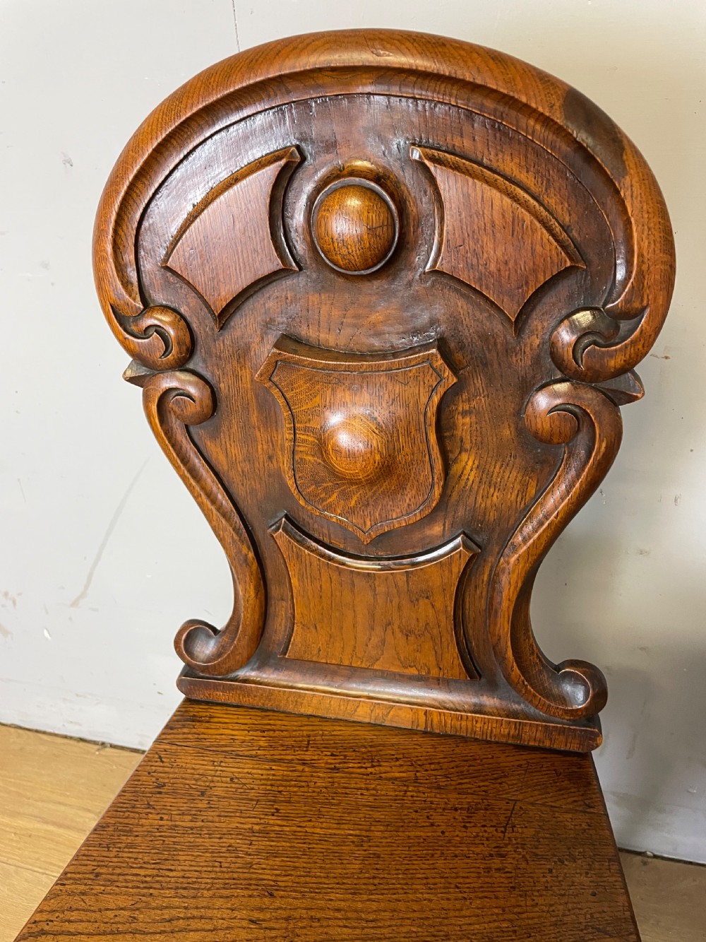 Pair of carved oak nineteenth century hall chairs  View IV