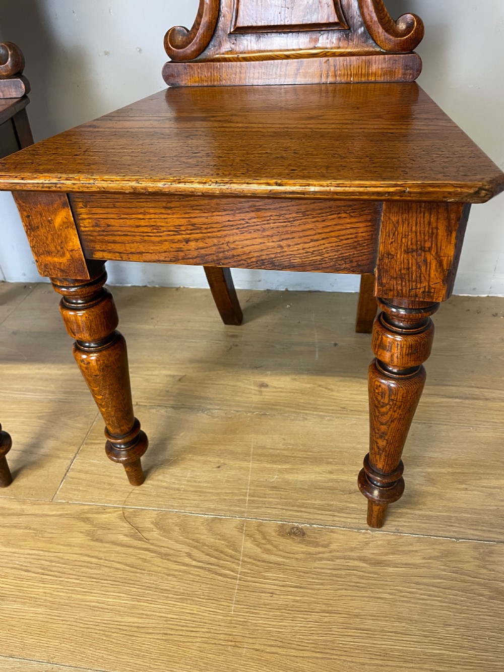 Pair of carved oak nineteenth century hall chairs  View VI