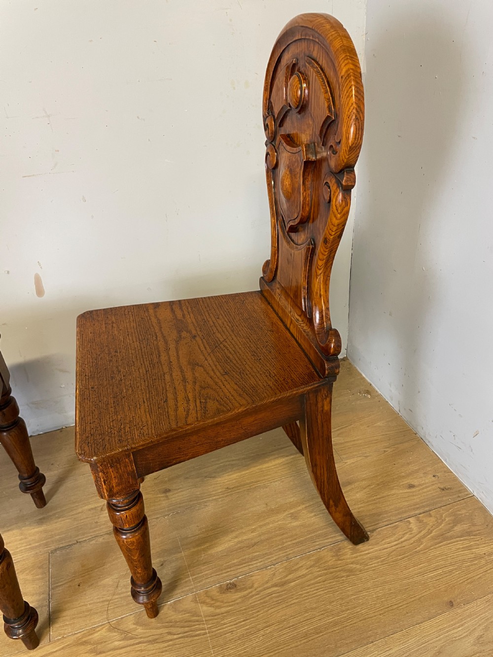 Pair of carved oak nineteenth century hall chairs  View VIII