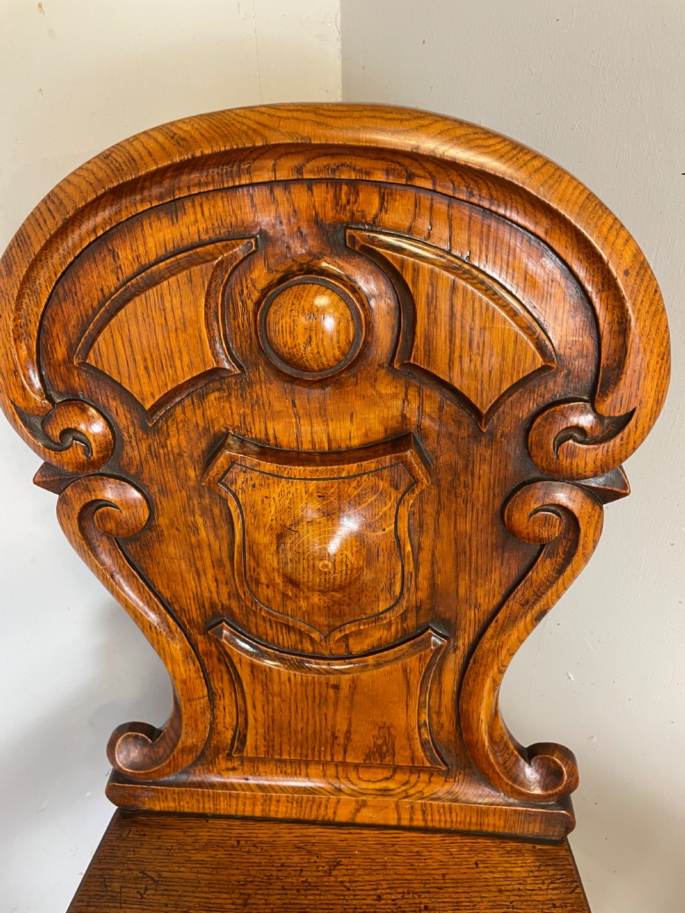 Pair of carved oak nineteenth century hall chairs  View XII