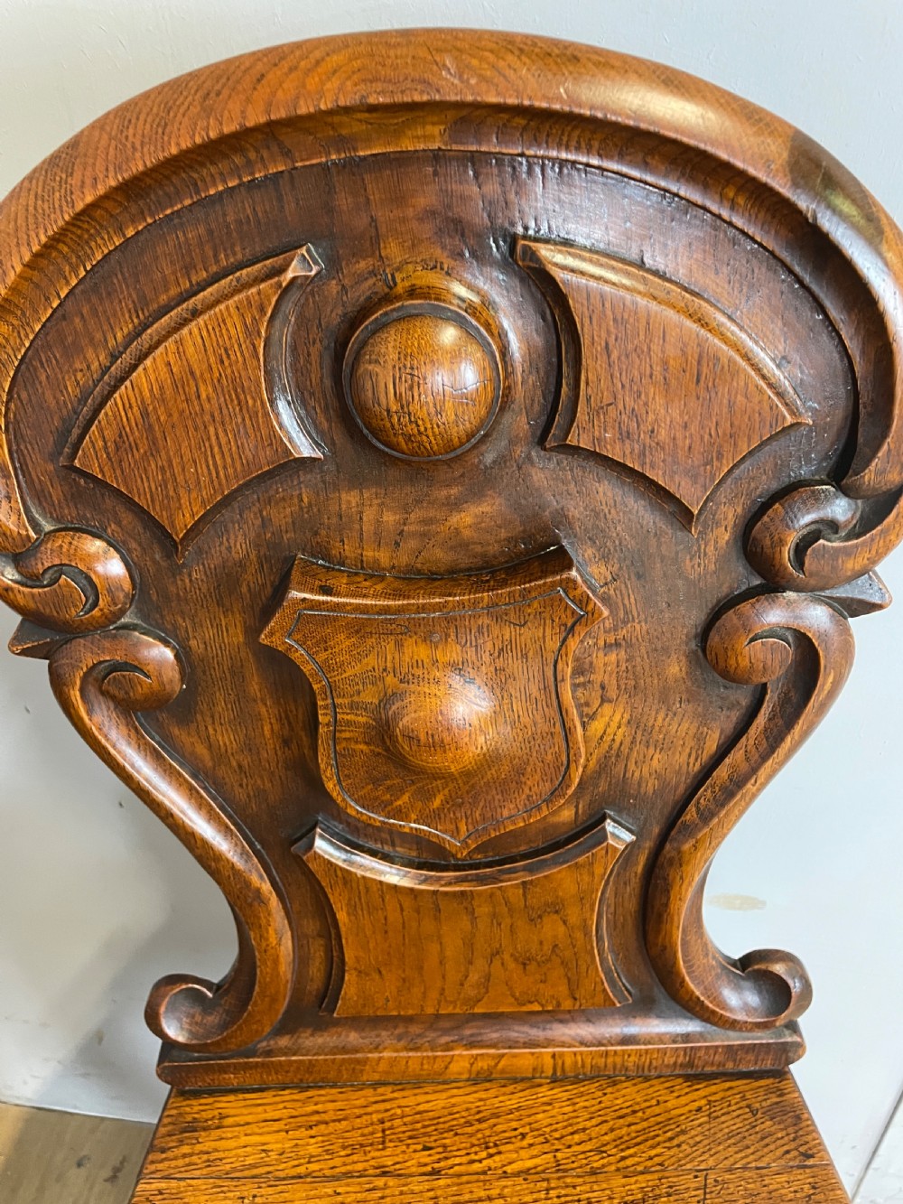 Pair of carved oak nineteenth century hall chairs  View XIII