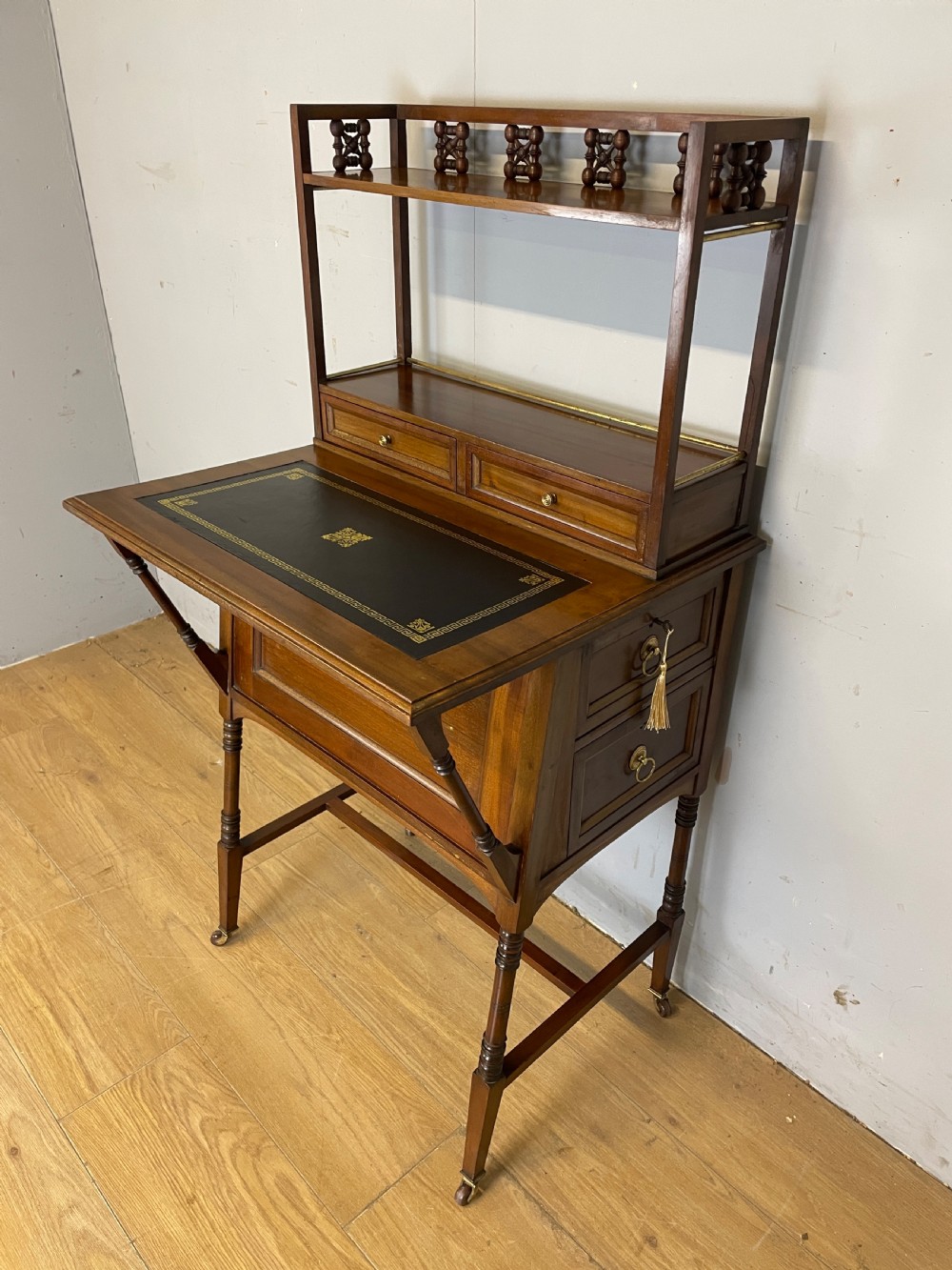 Liberty and Co Aesthetic Movement walnut writing desk in the manner of Christopher Dresser  View II