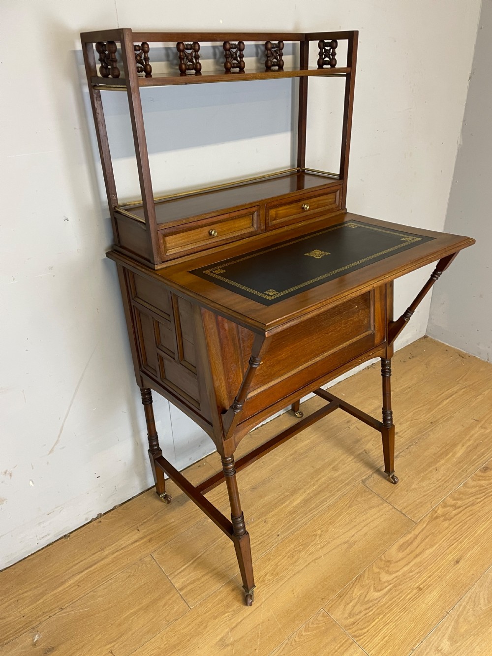 Liberty and Co Aesthetic Movement walnut writing desk in the manner of Christopher Dresser  View VI