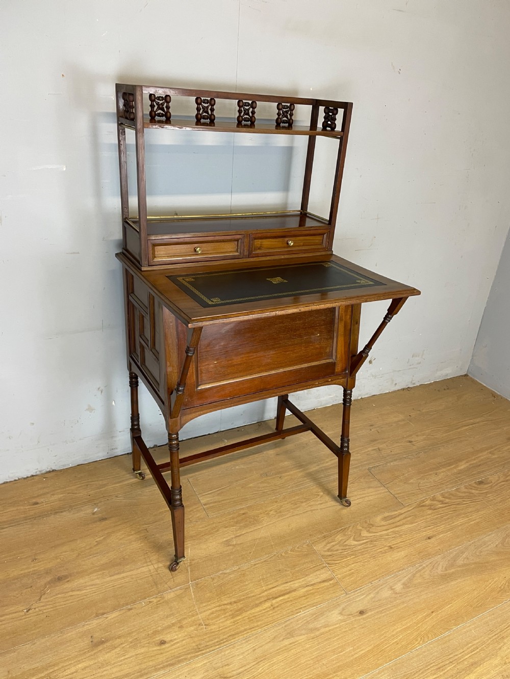 Liberty and Co Aesthetic Movement walnut writing desk in the manner of Christopher Dresser  View XIII