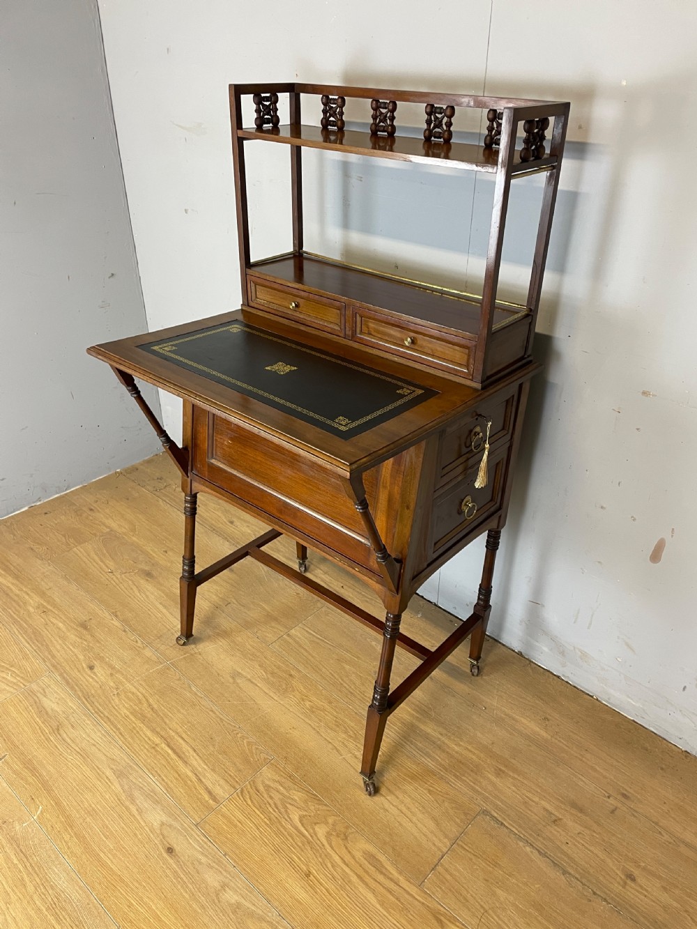 Liberty and Co Aesthetic Movement walnut writing desk in the manner of Christopher Dresser  View XV