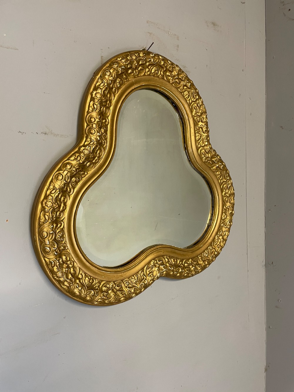 Edwardian gilt clover leaf bevelled mirror 