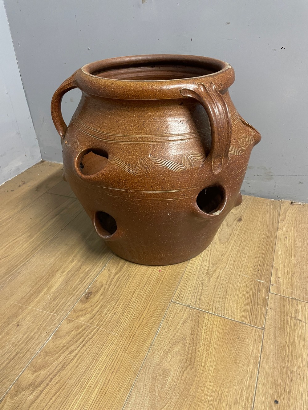 Large salt glazed strawberry pot circa 1920