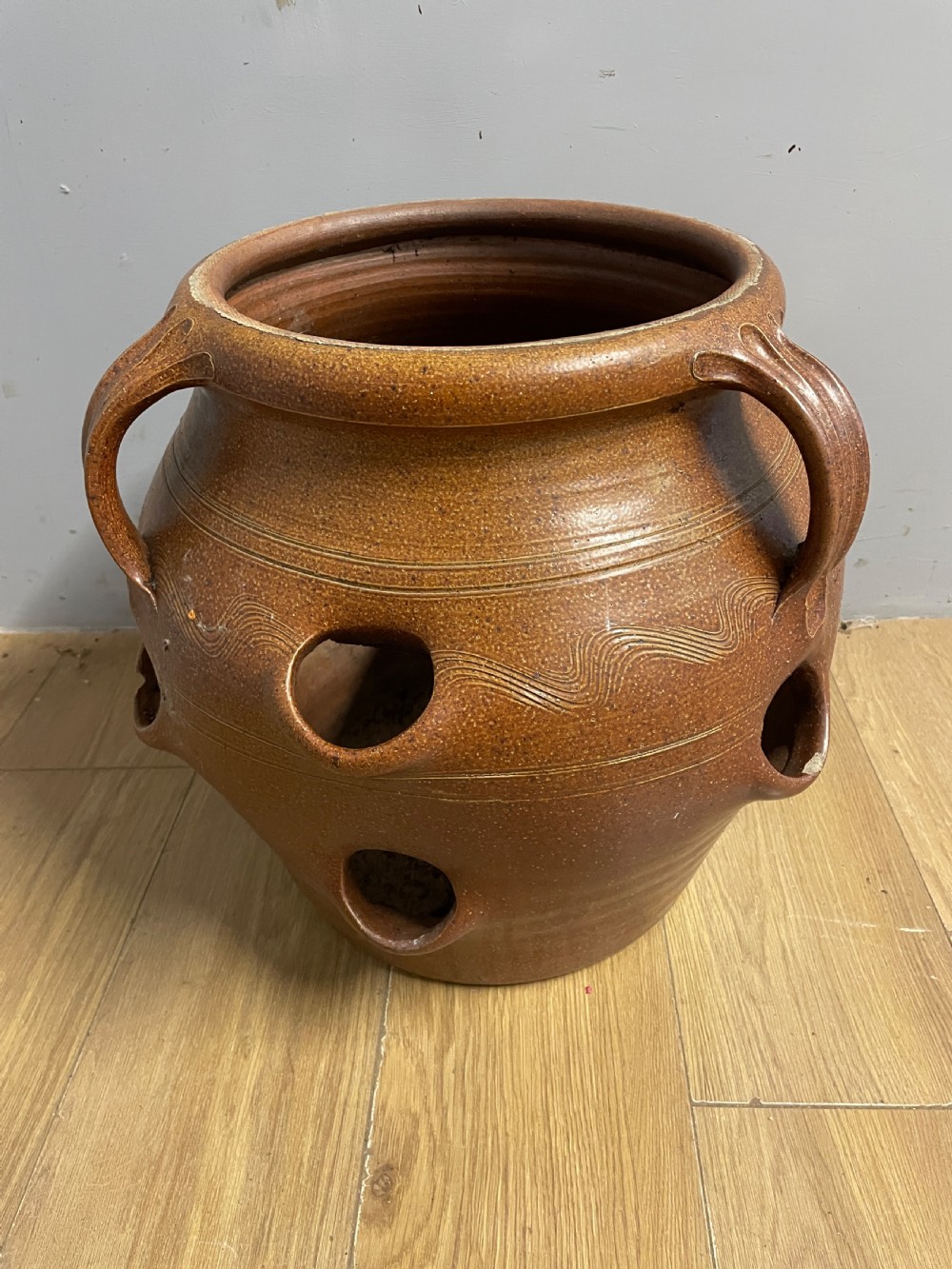 Large salt glazed strawberry pot circa 1920 View II