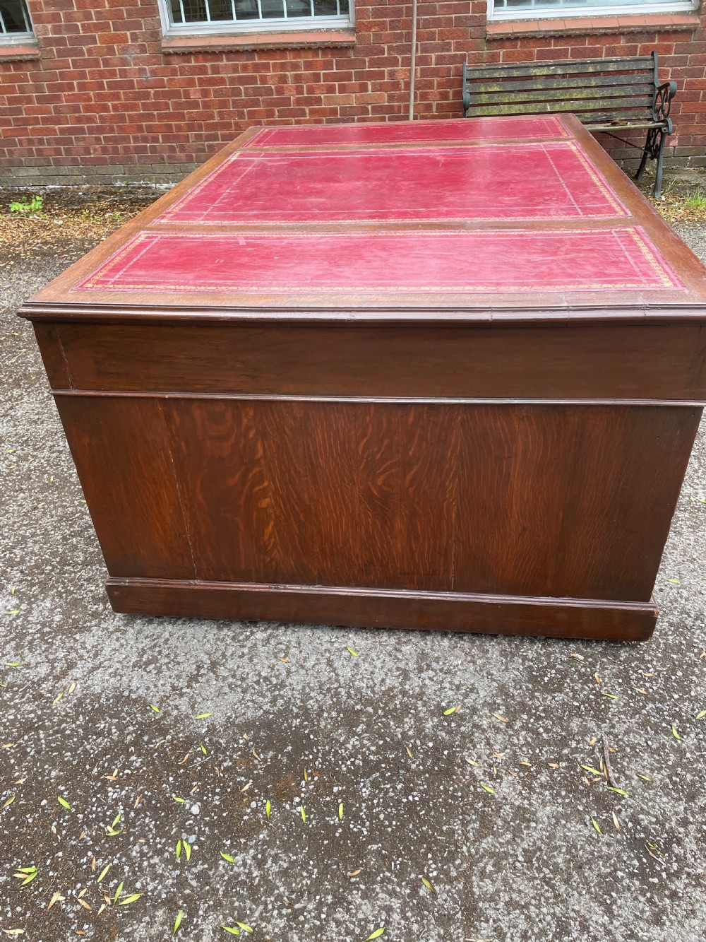 Late C19TH London made oak partners desk with inset red leather top  View V