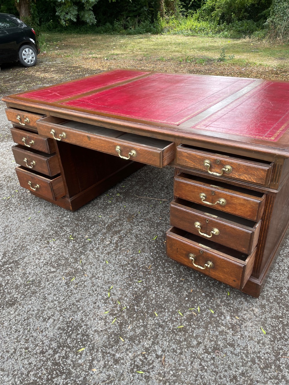 Late C19TH London made oak partners desk with inset red leather top  View VIII