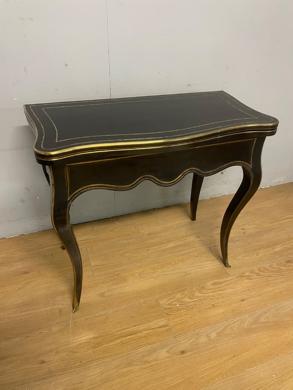 C19TH French  ebonized card table with brass inlay and moulding