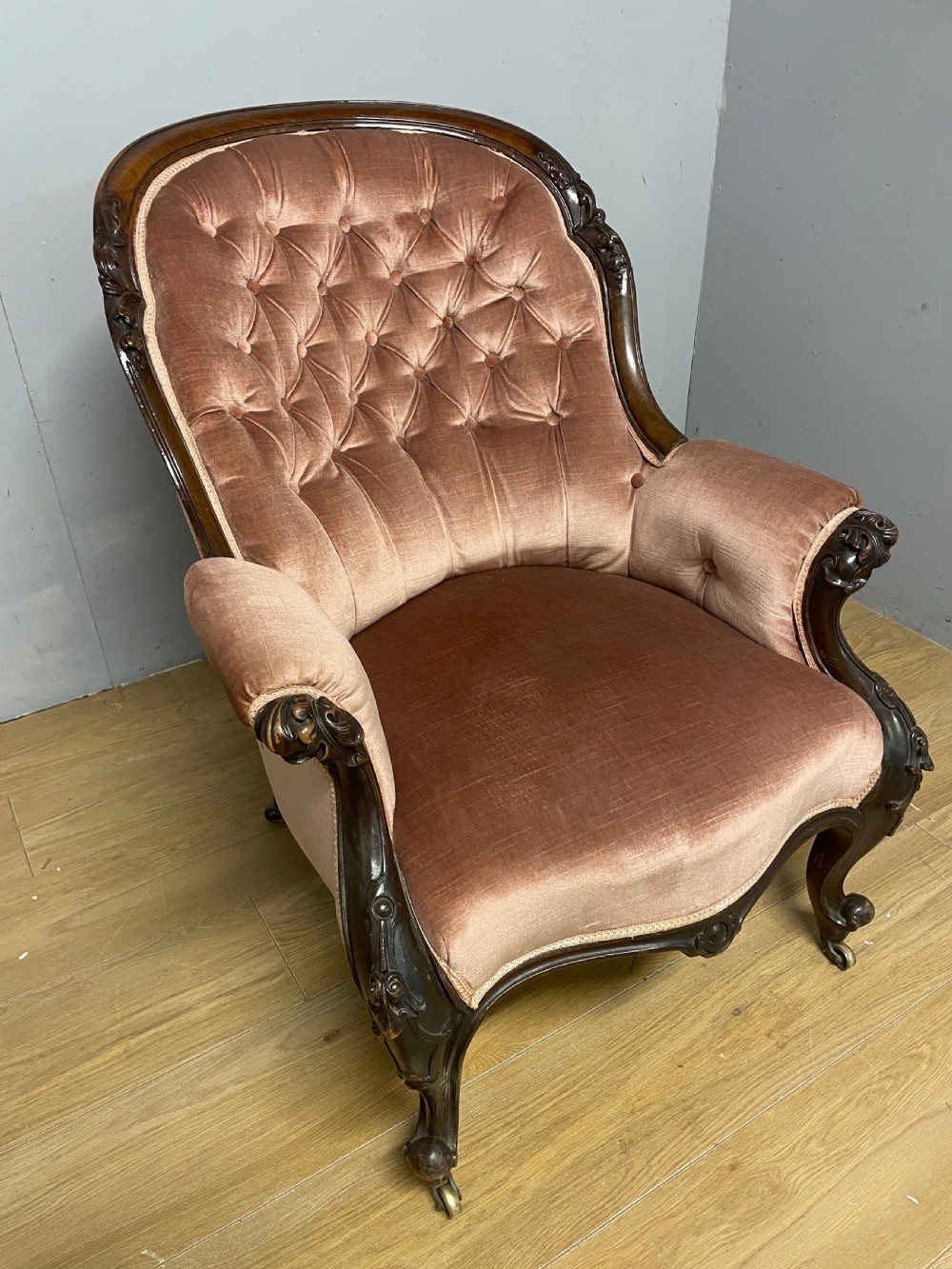 C19TH deep buttoned carved mahogany armchair   View II
