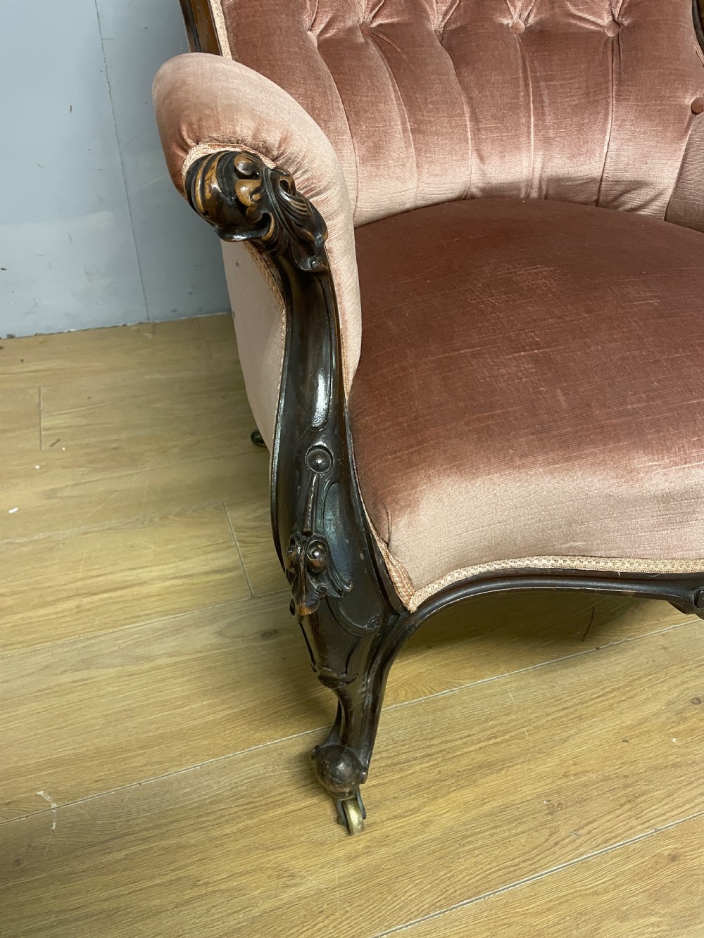 C19TH deep buttoned carved mahogany armchair   View III