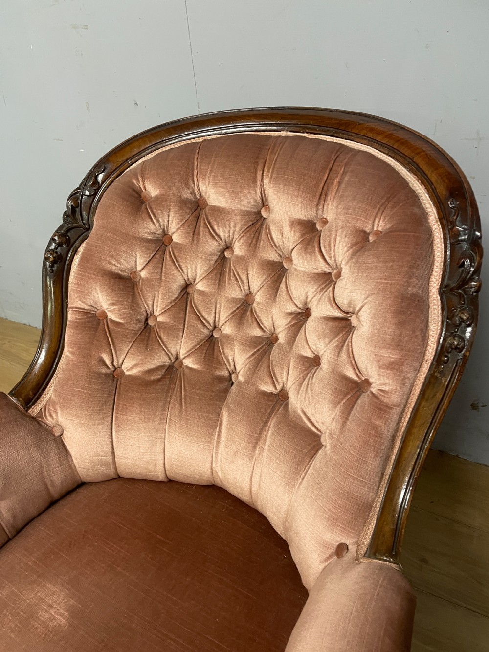 C19TH deep buttoned carved mahogany armchair   View IV