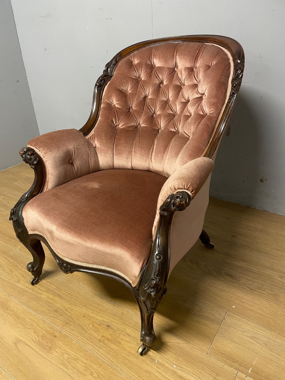 C19TH deep buttoned carved mahogany armchair   View V