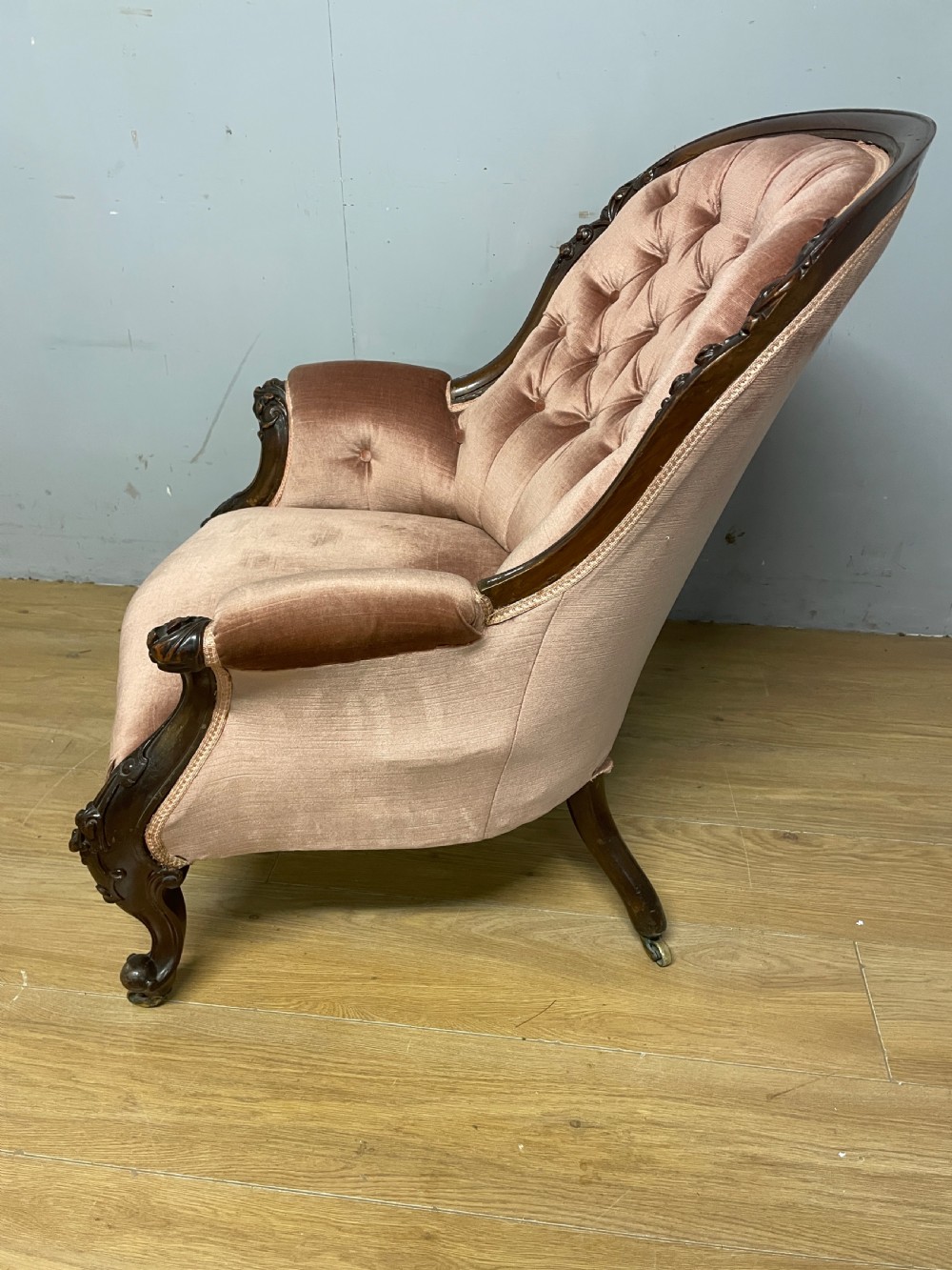 C19TH deep buttoned carved mahogany armchair   View VI