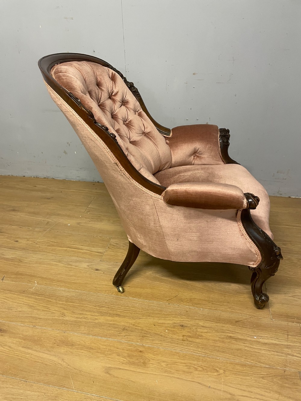C19TH deep buttoned carved mahogany armchair   View VIII