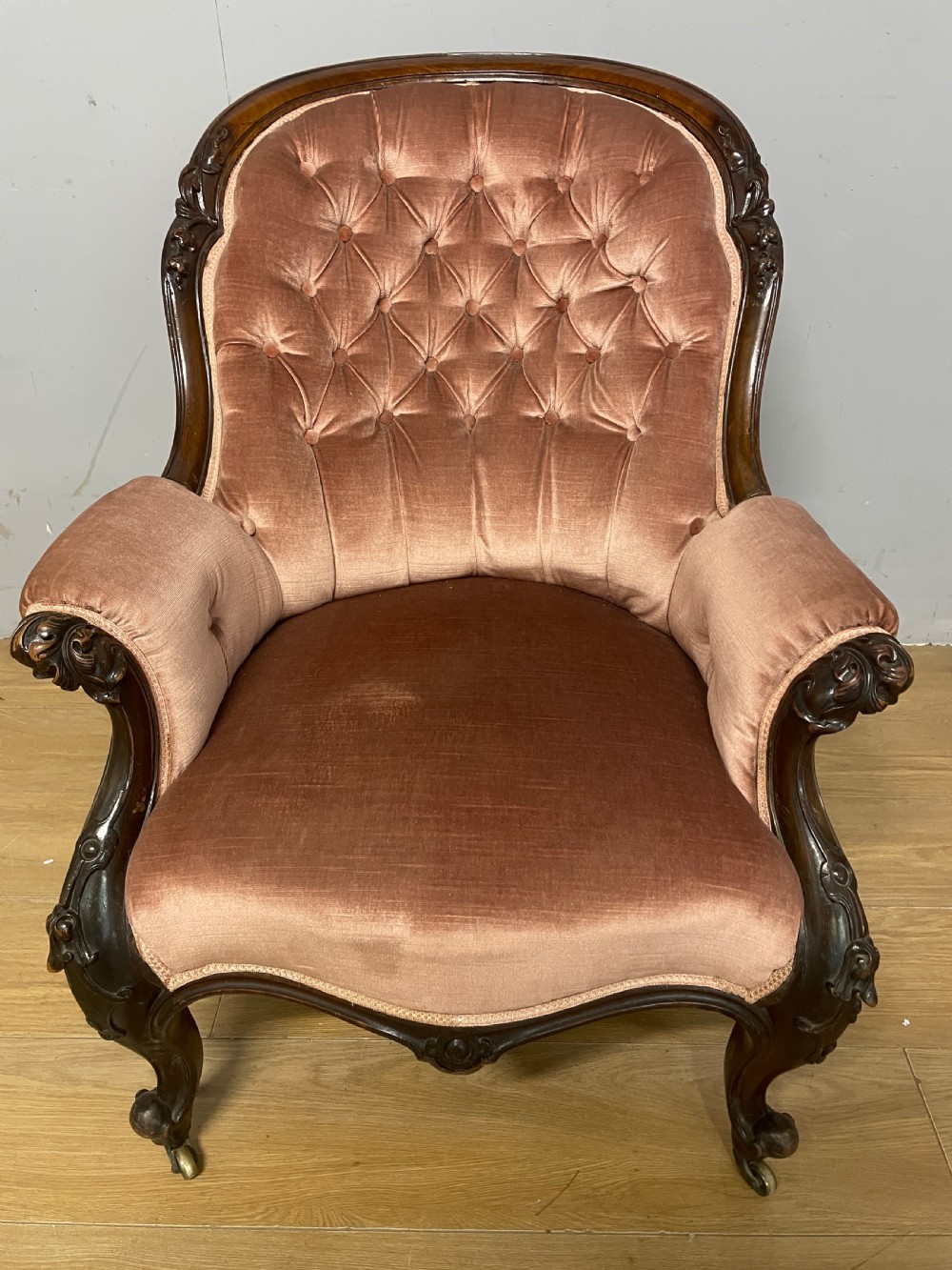 C19TH deep buttoned carved mahogany armchair   View IX