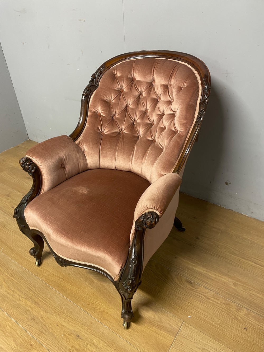 C19TH deep buttoned carved mahogany armchair   View X
