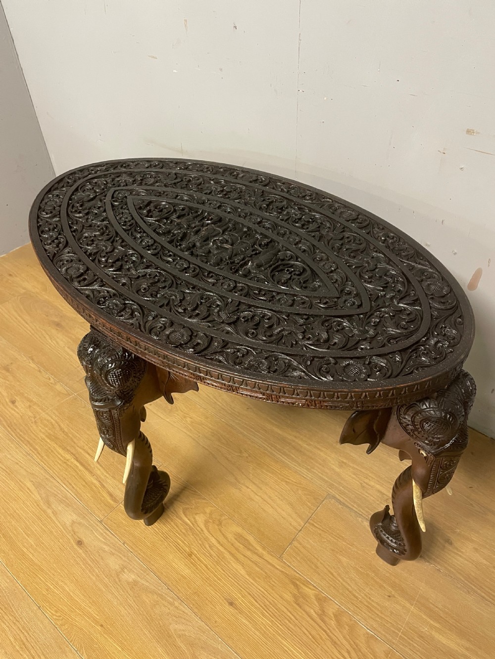 C19TH carved Indian oval table with stylised elephant legs  View II