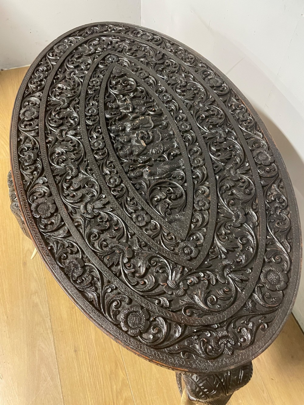 C19TH carved Indian oval table with stylised elephant legs  View III