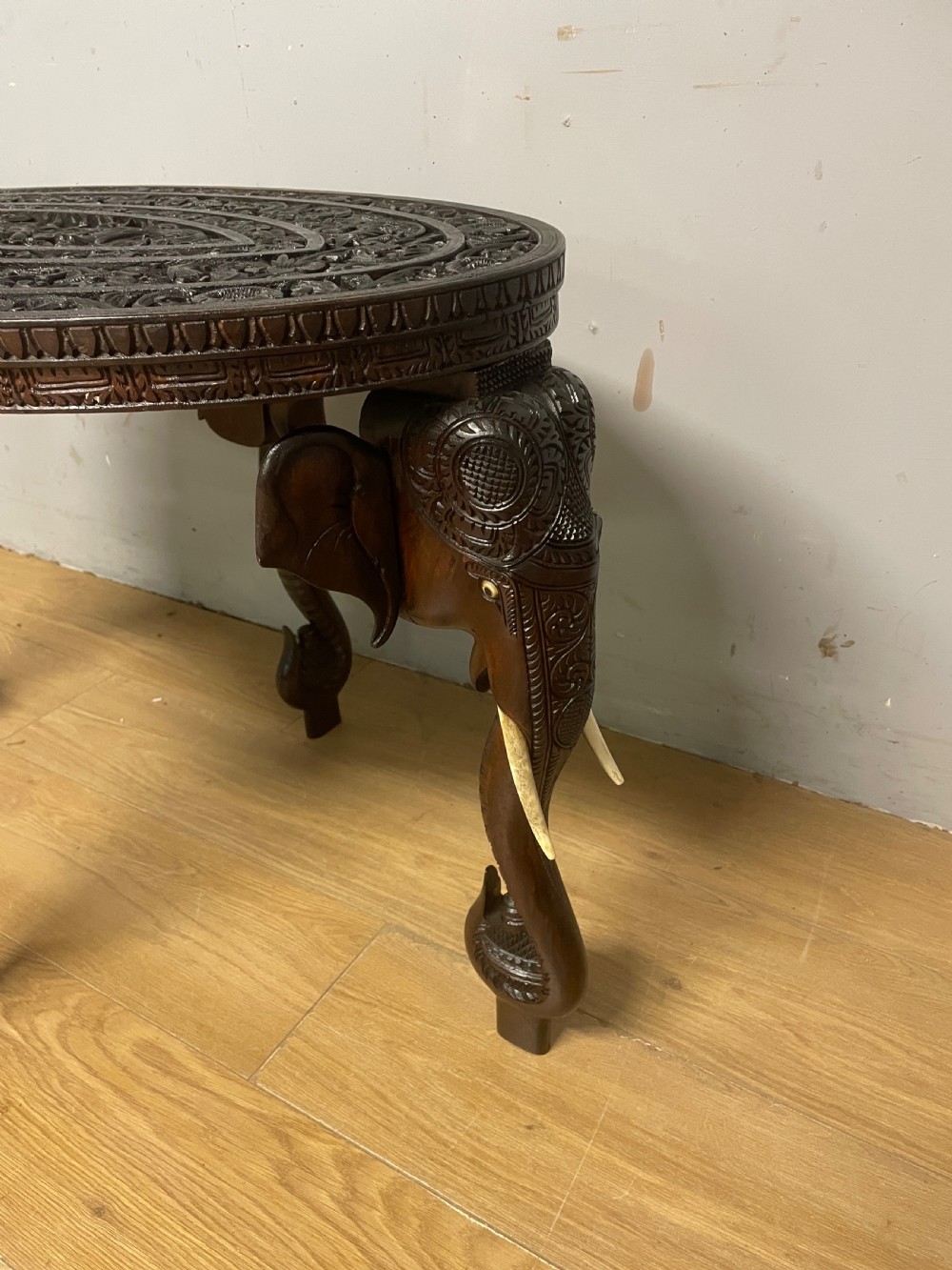 C19TH carved Indian oval table with stylised elephant legs  View IV