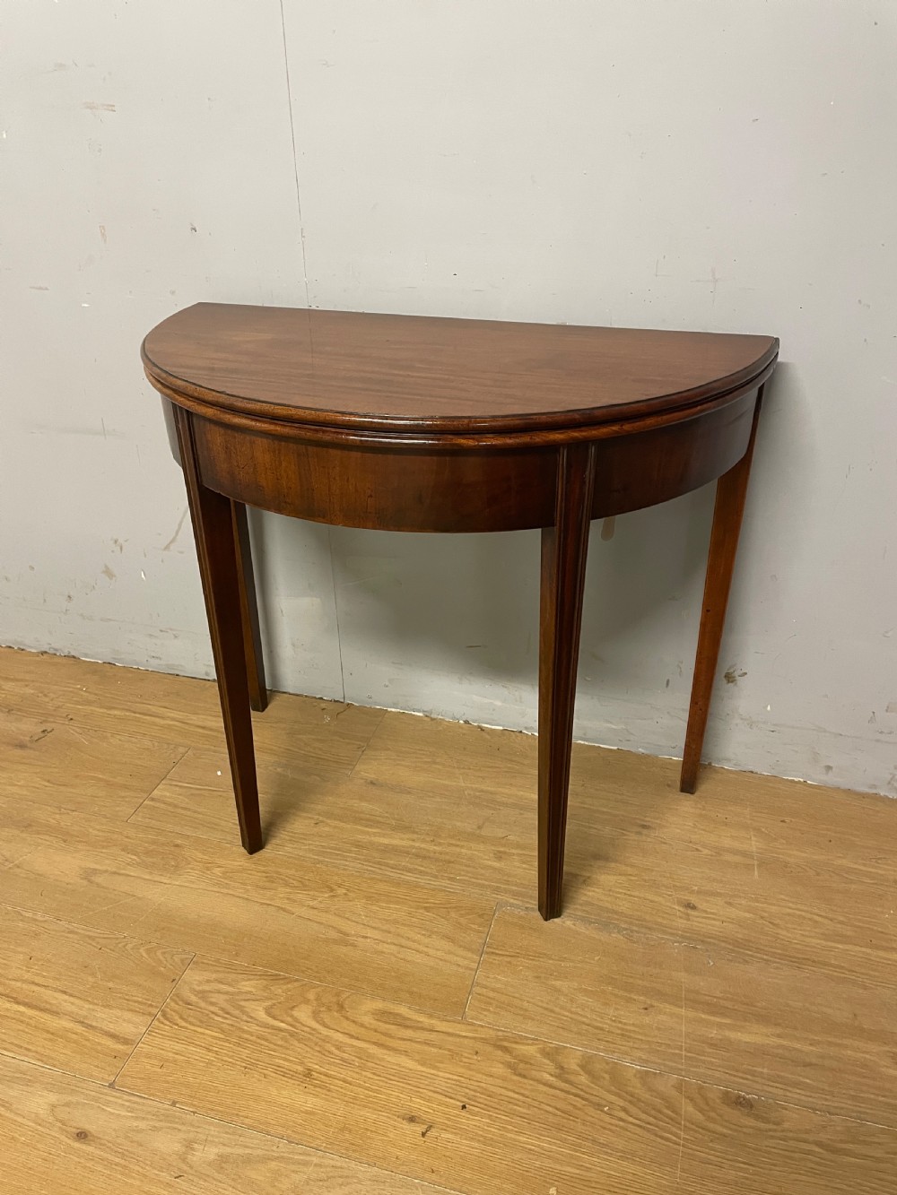 George III solid mahogany demi lune tea table circa 1790 View II