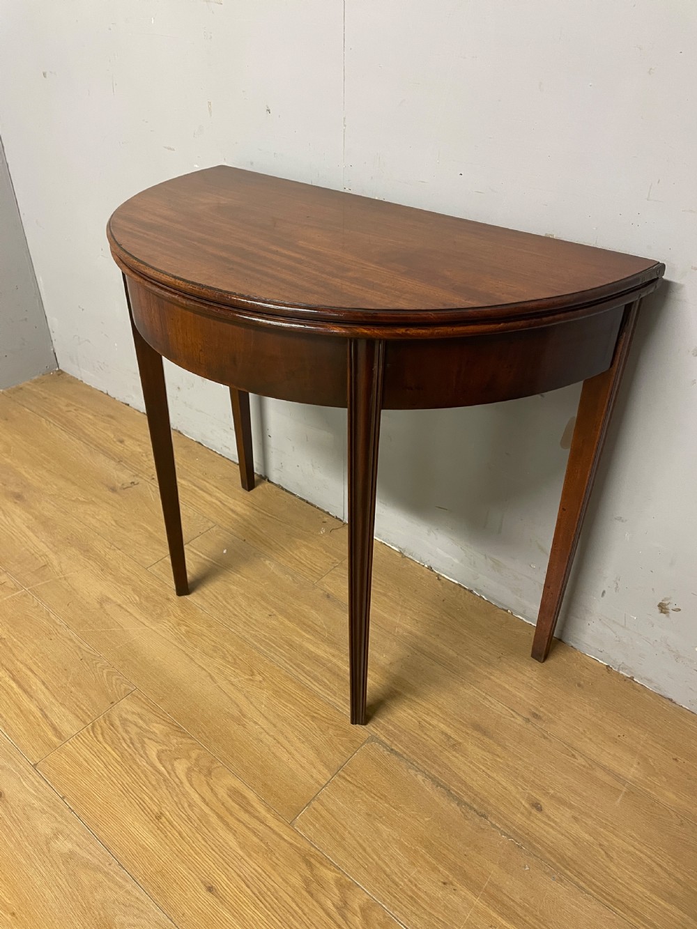 George III solid mahogany demi lune tea table circa 1790 View X
