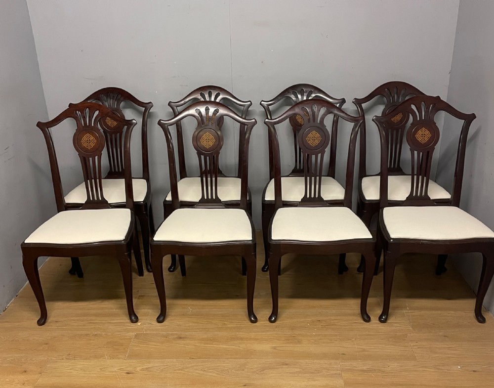 Set of eight Edwardian inlaid solid mahogany dining chairs  View II