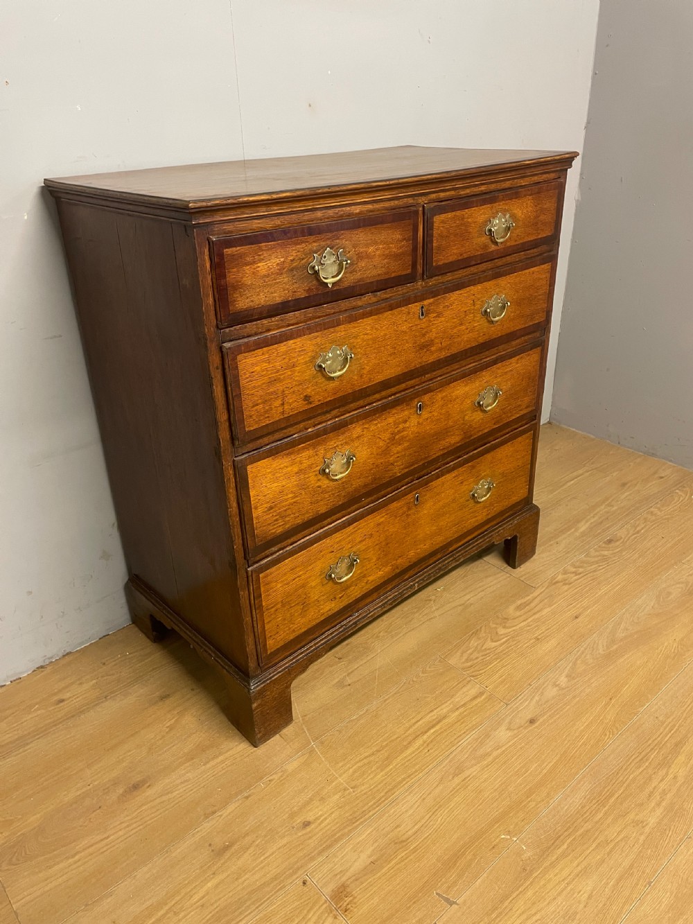Georgian oak and cross banded mahogany four height chest of drawers circa 1790 View III