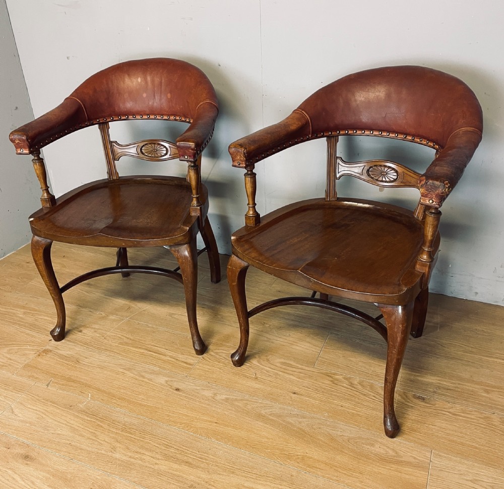 Pair of Victorian mahogany and leather library desk chairs  View III