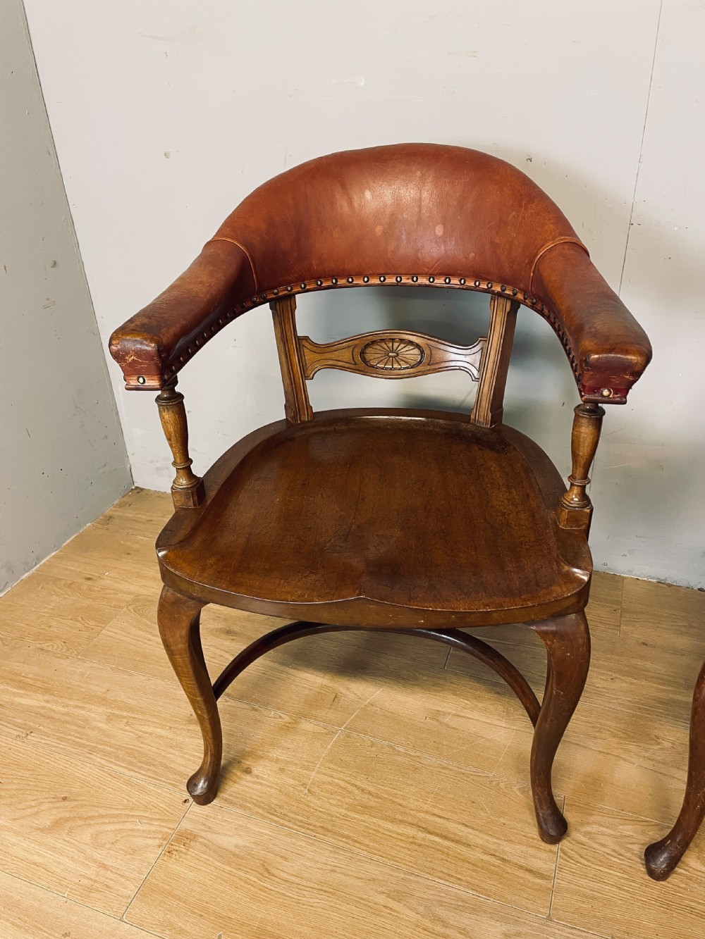 Pair of Victorian mahogany and leather library desk chairs  View V